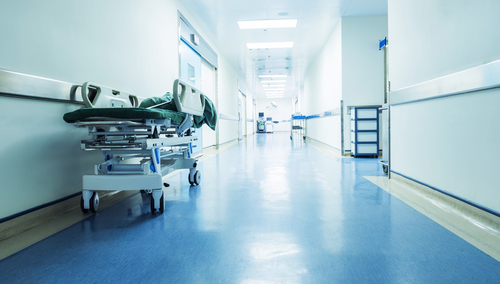 Hospital bed in hallway